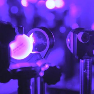 "Lasers are used to probe the vibrational dynamics of 2D hybrid perovstikes. (Credit: Georgia Tech/ Robert Felt)"