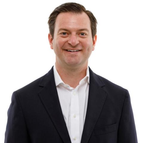 Headshot of Ryan Alpert, Athletic Director, on a white background