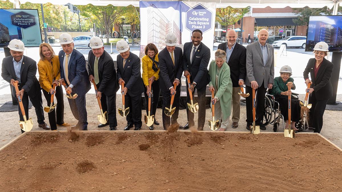 Leaders turn over the first dirt at the site of the future Tech Square Phase 3 towers