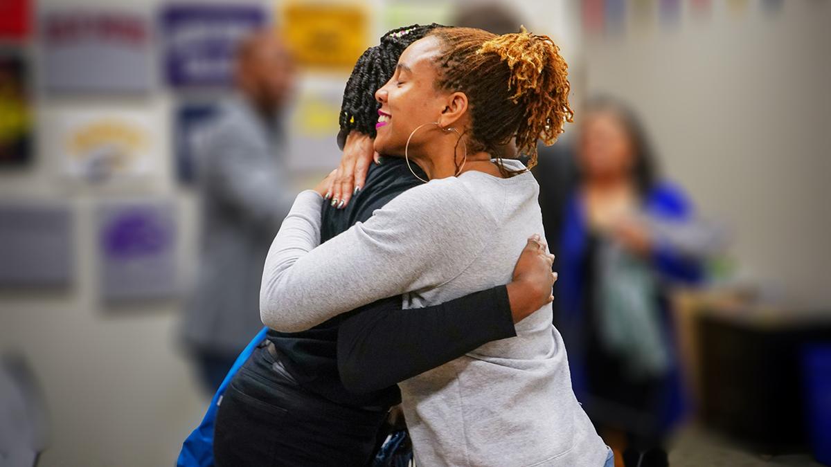 Hugs after news of acceptance into Georgia Tech.