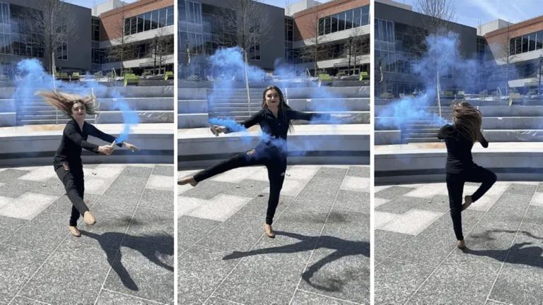 Grad student Alisyn Bourque holds smoke while turning in a study involving the fluid dynamics of dance.
