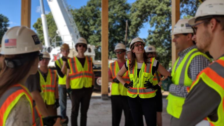 Amy Stone on site of The Kendeda Building construction.