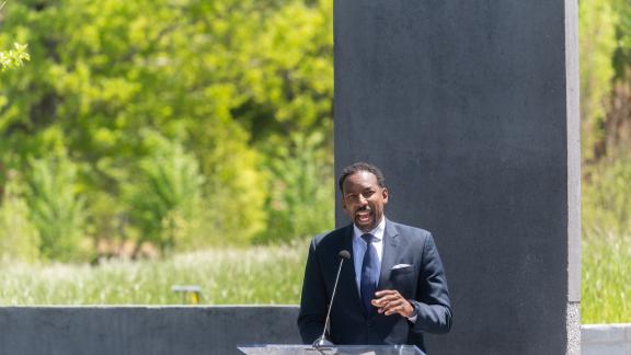 Andre Dickens, Atlanta city council member who also serves on the Georgia Tech Alumni Association board of trustees, speaks about the historical significance of events that took place at the EcoCommons site at an event in April 2021. Photo by Allison Carter.