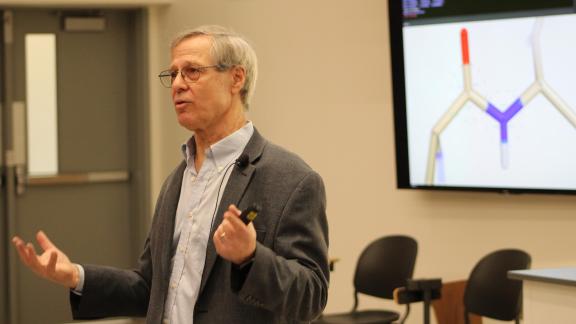 Professor Loren Wiliams holds a lecture in Howey Physics. 