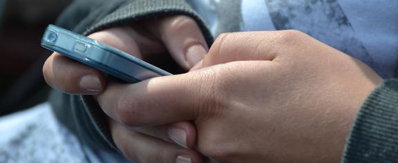 Hands with cellphone