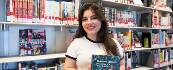 Shamim Shoomalim with her book, 'Between Classes.'
