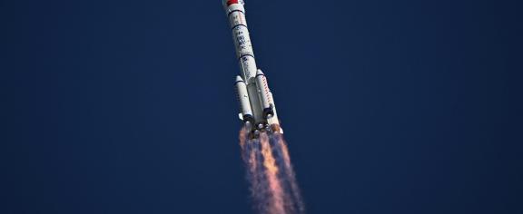China’s Shenzhou-20 spacecraft – shown here hitching a ride on a Long March-2F carrier rocket – was hit by a piece of space debris. Pedro Pardo/AFP via Getty Images