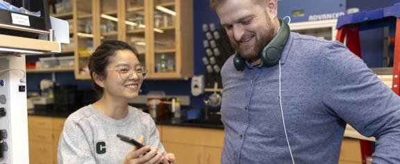 Assistant Professor Alex Adams (right) created the Uncommon Sense Lab to develop novel sensing systems for health.