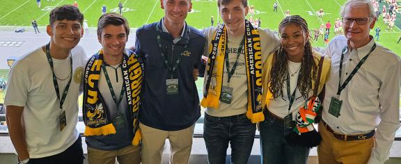 Dick Bergmark (right) and students