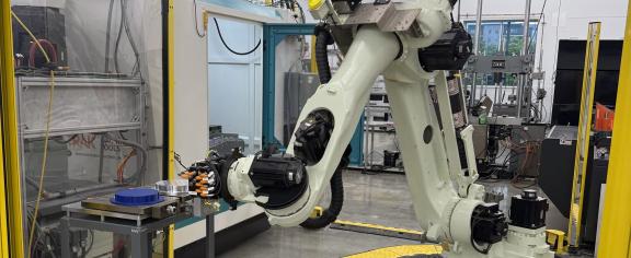  A robotic arm moves amongst AMPF facilities