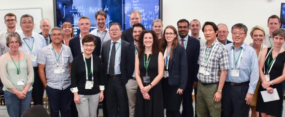 A group photo of the international data science summit held in conjunction with KDD.