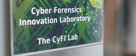 Sign reading Cyber Forensics Innovation Laboratory The CyFI Lab