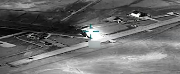  black and white aerial view of an airfield AI is helping U.S. forces find and choose targets in Iran, like this airfield. U.S. Central Command via AP