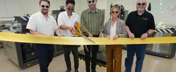 Pictured left-to-right: Tim Trent, director of IPaT's Trash Lab; Arthur Huang, CEO of Miniwiz; Michael Best, executive director of IPaT; Jennifer Chirico, associate vice president of Sustainability; and Rob Kadel, executive director of research program administration.