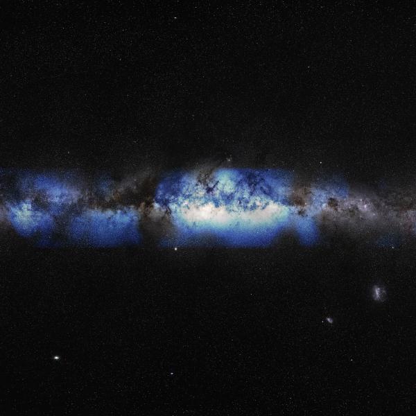 An artist’s composition of the Milky Way seen with a neutrino lens (blue). (IceCube Collaboration/U.S. National Science Foundation (Lily Le &amp; Shawn Johnson)/ESO (S. Brunier))