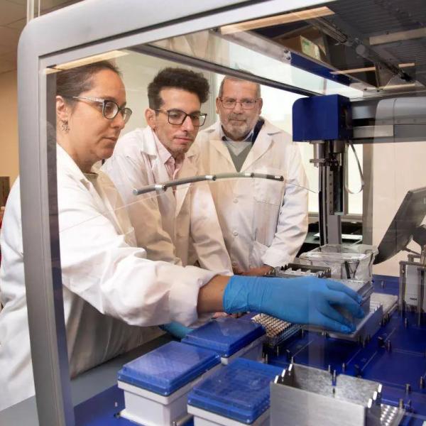 
Researchers, from left, Lorena Chaves, Jose Assumpcao, and Philip Santangelo will be part of a collaborative effort to use mRNA drugs to enhance the body’s immune response. Santangelo is leading the $24 million project supported by the federal Advanced Research Projects Agency for Health. (Photo: Jack Kearse)

