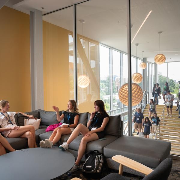 Students talk on campus during new student orientation. Photo by Allison Carter
