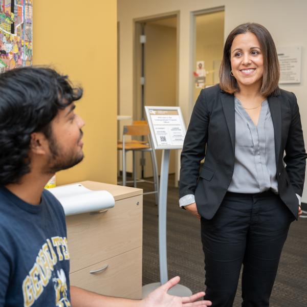 Beatriz Rodriguez with student assistant Parth Gandhi, a third-year student in the Scheller College of Business. Photo by Allison Carter.
