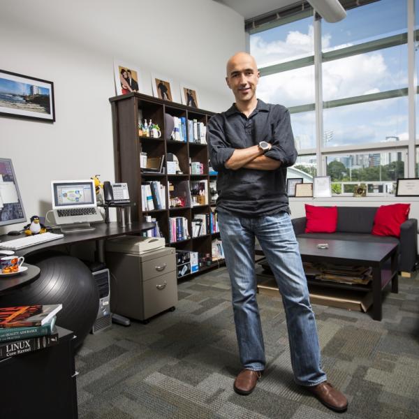 Alex Orso is pictured standing in his office on the Georgia Tech campus. He will assume the role of interim dean of the College of Computing, effective Aug. 1.
