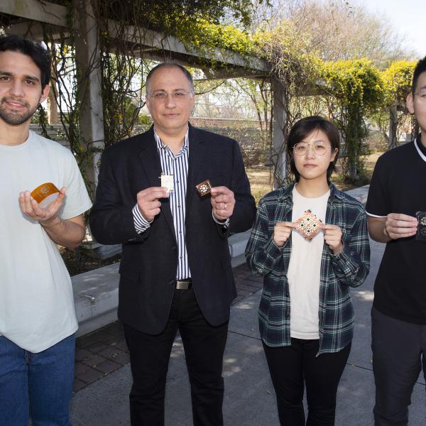 Genaro Soto Valle, Manos Tentzeris, Kexin Hu, and Yepu Cui with the fabricated proof-of-concept tile arrays and inkjet-printed tile arrays.